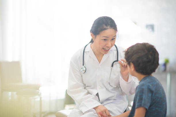 istock Little boy nervous at the doctor's 1159701458