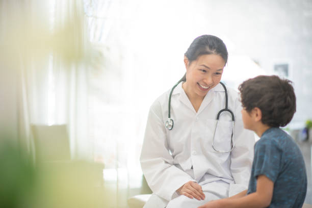 istock Little boy nervous at the doctor's 1159701486