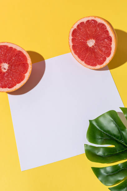 istock Creative fruit composition on yellow background with hard shadows. Summer minimal concept. 1159703086