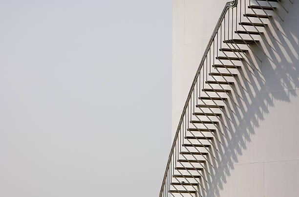 istock Ladder on oil storage tank 115970376