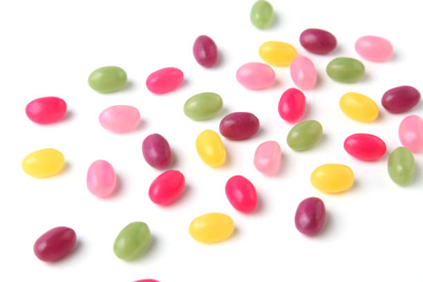 istock colorful candies jelly beans spread on white background 1159705219