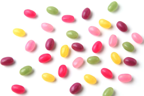 istock colorful candies jelly beans spread on white background 1159705226