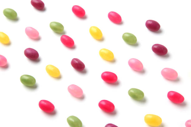 istock colorful candies jelly beans spread on white background 1159705247