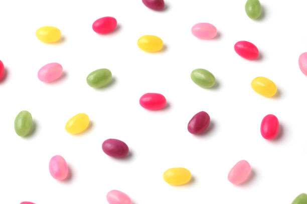 istock colorful candies jelly beans spread on white background 1159705278