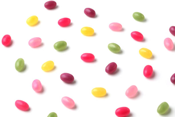 istock colorful candies jelly beans spread on white background 1159705295