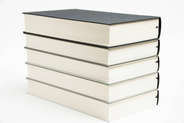 istock A Set Of Neatly Stacked Monochromatic Cloth Bound Books 1159707247