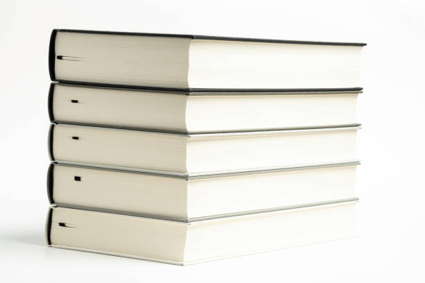 istock A Set Of Neatly Stacked Monochromatic Cloth Bound Books 1159707510
