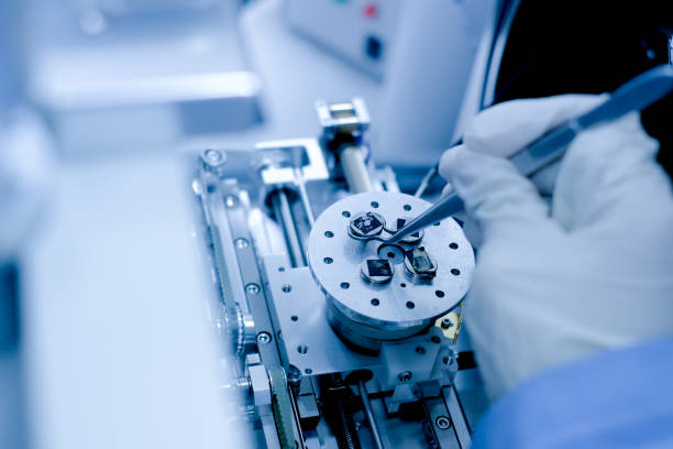 istock Scientist is preparation of nanomaterials for Scanning Electron Microscope (SEM) machine in laboratory 1159708293