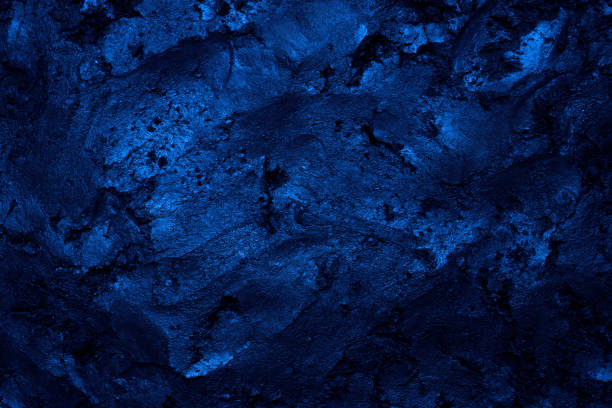 istock Blue tinted image of mud texture background 1159715155
