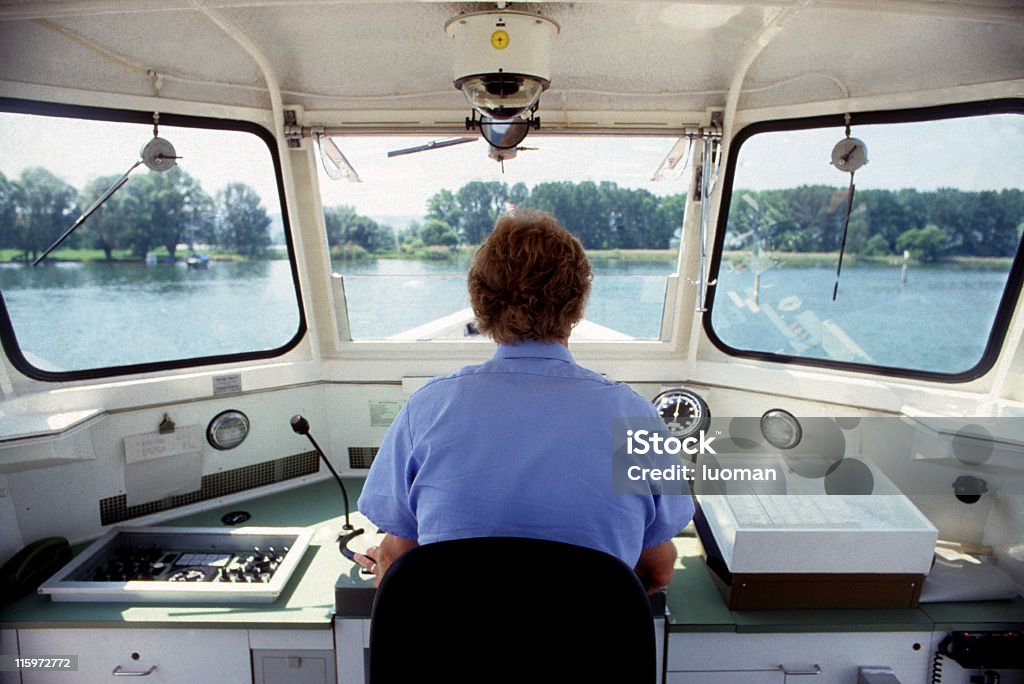Boat captain Arbeiten - Lizenzfrei Wasserfahrzeug Stock-Foto