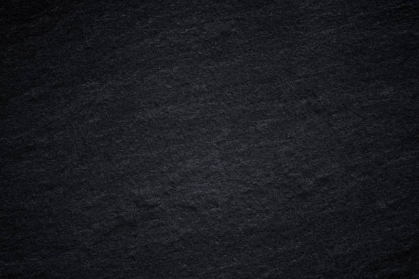 istock Dark grey black slate background or natural stone texture. 1159727734