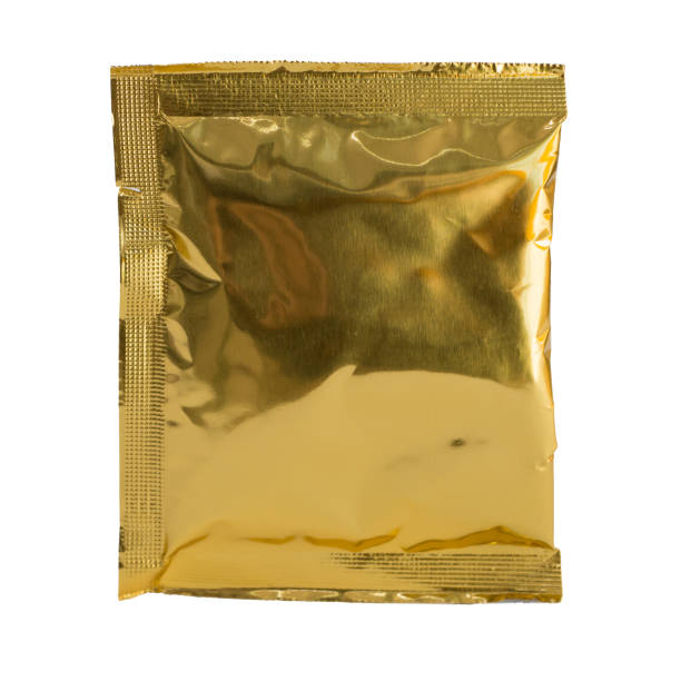 istock square gold aluminium foil bag isolate on white background with clipping path 1159728565