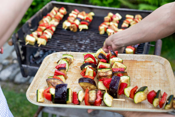 istock Grilling vegetables on skewers outdoor 1159729500