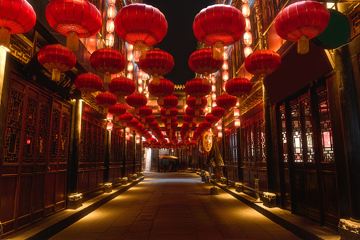 The traditional red Chinese lanterns in JInli,Chengdu,China during Chinese Lunar New Year.The Chinese characters on the inscription mean