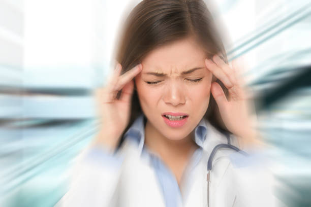 istock Migraine and headache people - Doctor stressed 1159732693