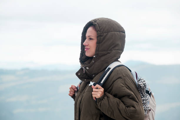 Latin ethnic brunette woman between 25-30 years old doing trekking alone..