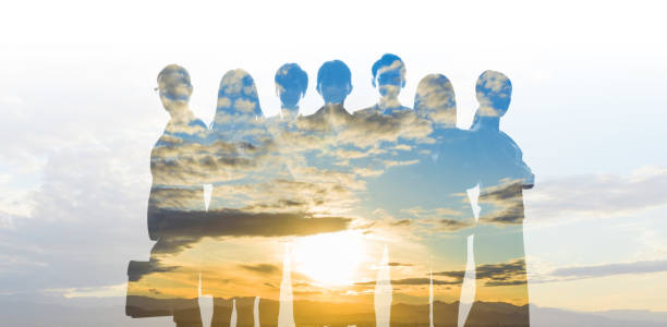 Double exposure of sunshine and group of people. Double exposure of sunshine and group of people. dawn of new era stock pictures, royalty-free photos & images