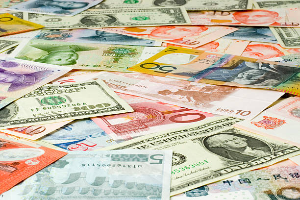 istock Close up of currency bills from different countries 115974498