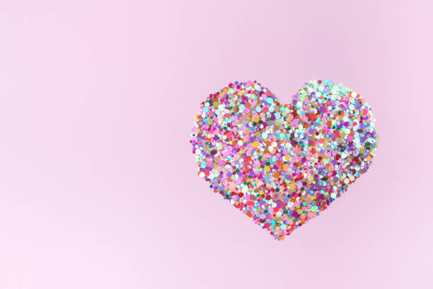 istock Confetti hearts on pink background. 1159745462