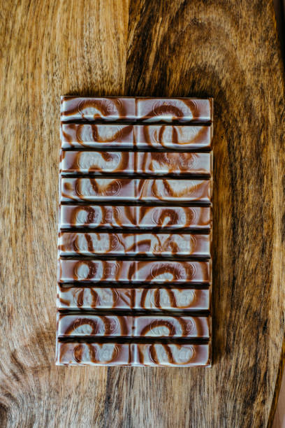 istock milk chocolate on wood 1159752871