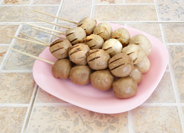 Meatball skewers grill on plate