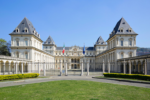 View on Tuileries garden in Paris, building of Rivoli street in background. France