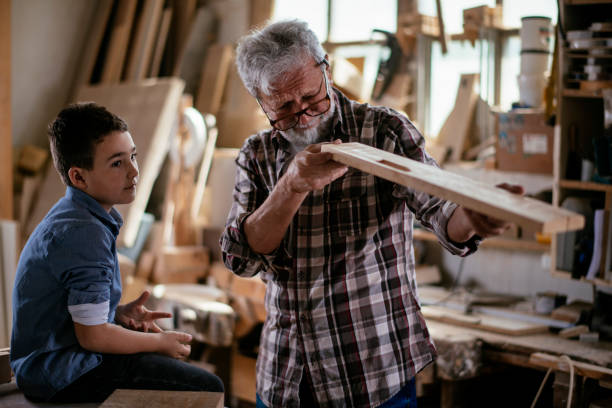 istock Grandfather teaching his grandson 1159763871