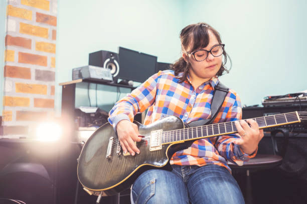 istock Who says that she can't play guitar 1159766210