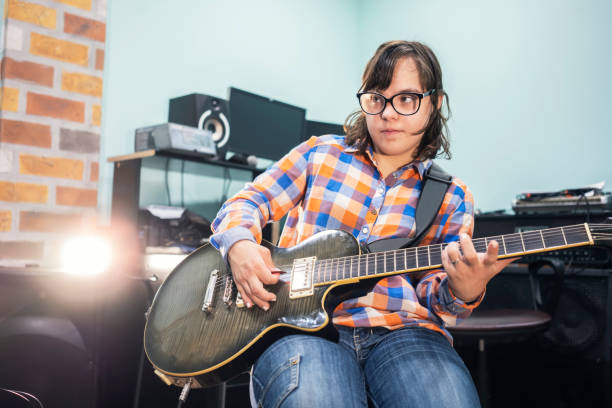 istock Who says that she can't play guitar 1159766243