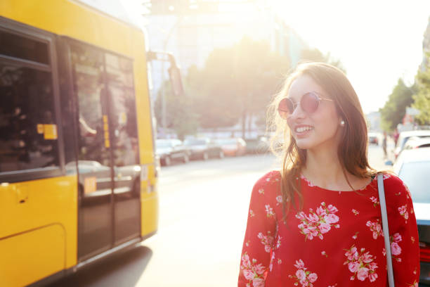 istock Young happy woman walking 1159766295