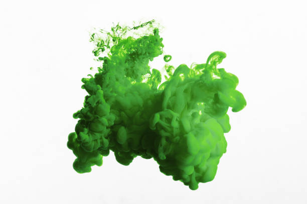 istock Close up view of green paint splash isolated on white 1159766433