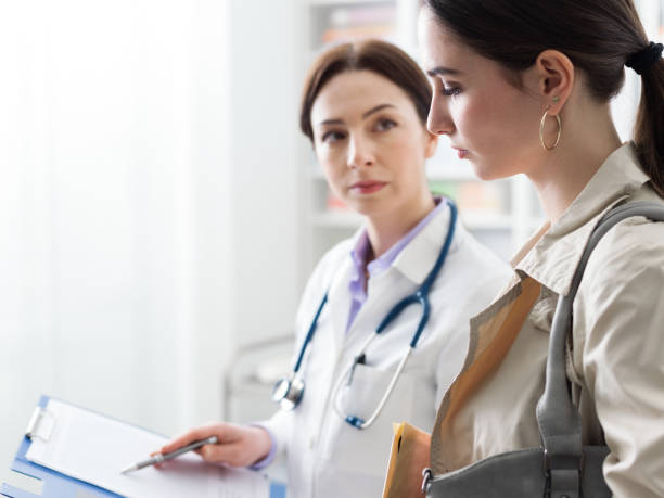 istock Doctor meeting a patient in the office 1159775020