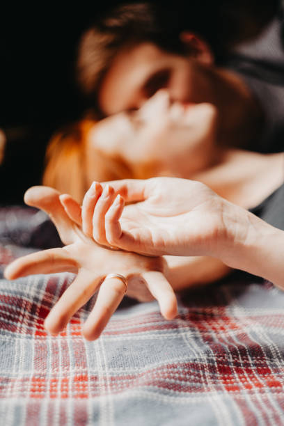 istock Lovers twist fingers 1159782472