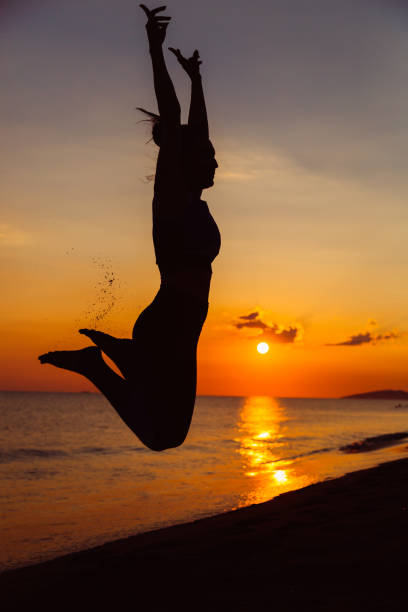 istock Woman doing yoga 1159785695