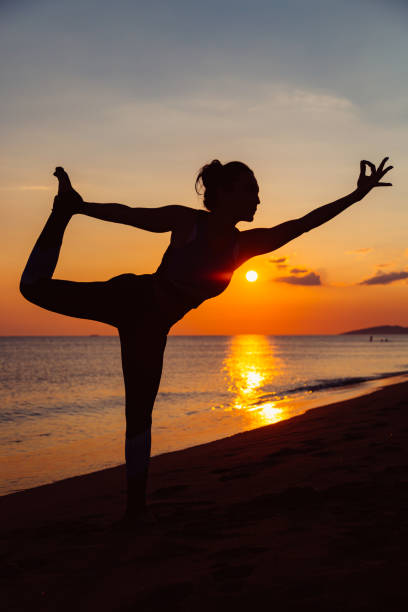 istock Woman doing yoga 1159785707
