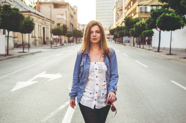 istock Walking down the city street 1159786915