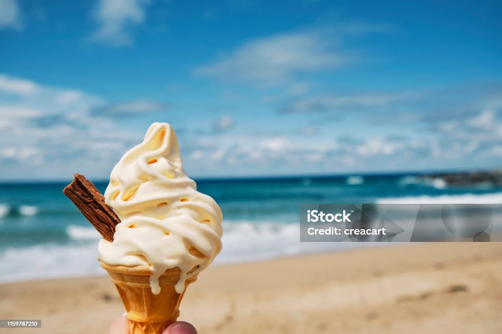 melting Ice cream at Fistral beach, Newquay, Cornwall on a bright sunny June day. Summer Stock Photo