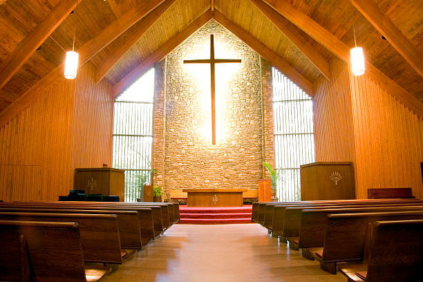The view from the aisle of a Christian church.
