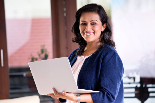 istock Businesswoman using laptop 1159793135
