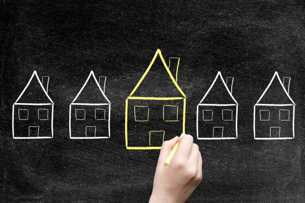 istock Mortgage, House Drawing on blackboard 1159796350