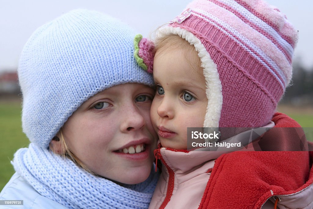 Happy children Happy children in winter outfit  on a background of field Baby - Human Age Stock Photo