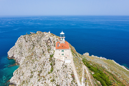 Unique aerial view on lighthouse on the most remote Croatian island Palagruza. Shot with drone DJI Mavic 2 Pro.