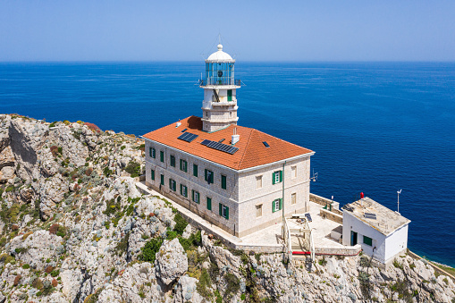 Unique aerial view on lighthouse on the most remote Croatian island Palagruza. Shot with drone DJI Mavic 2 Pro.