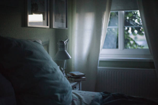 istock White warm summer night in the cozy bedroom in june 1159797621