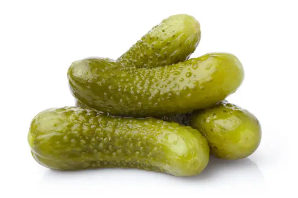 Photo of Marinated pickled cucumbers on white