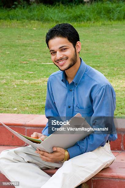 One Indian Student Office Worker Businessman With File Vertical Outdoor Stock Photo - Download Image Now