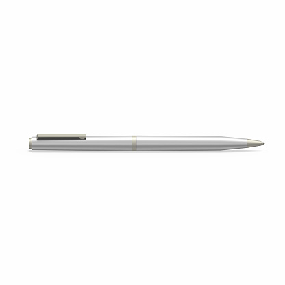 Silver ballpoint pen laying on table isolated on white