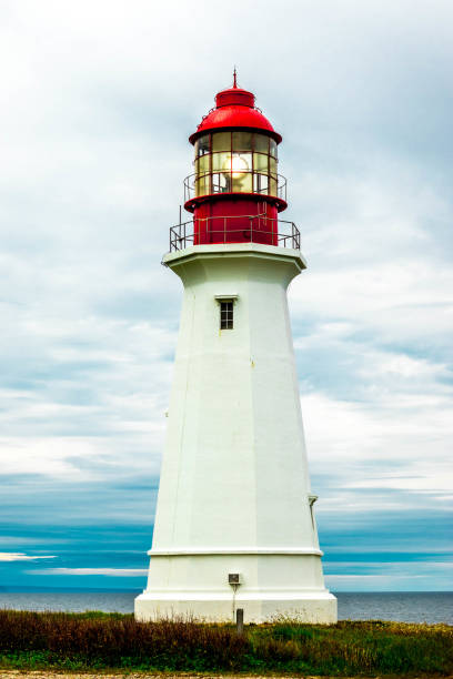 istock Lighthouse in New Victoria, Cape Breton Nova Scotia 1159802298
