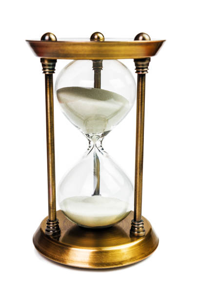 istock golden hourglass on white 1159802633