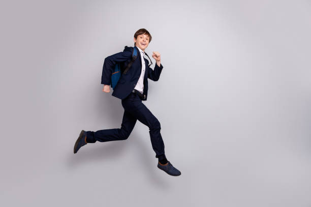istock Full length body size view photo of cheerful boy fast want get knowledge courses dressed style stylish white shirt black jacket blazers isolated grey silver background 1159804329